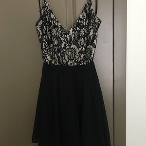 Lacey black dressy romper